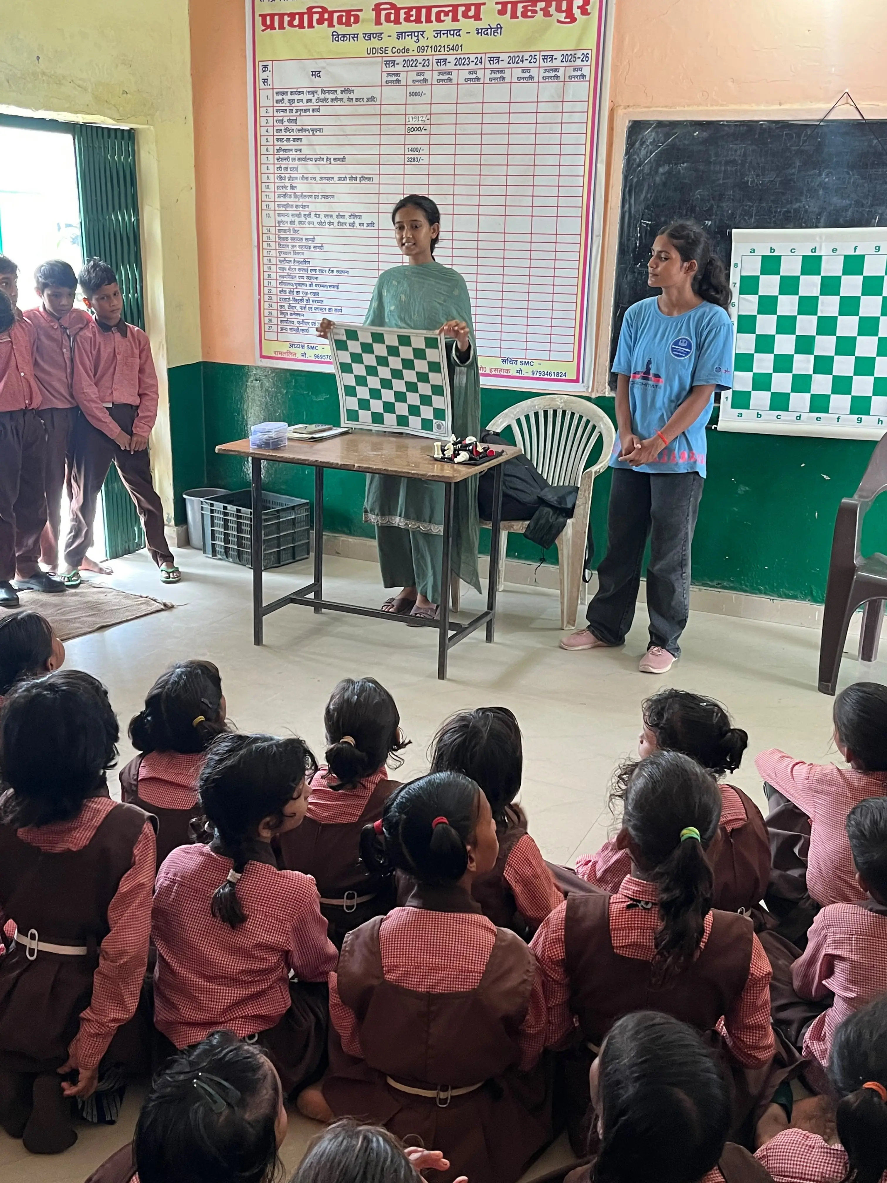 Girls competing at chess